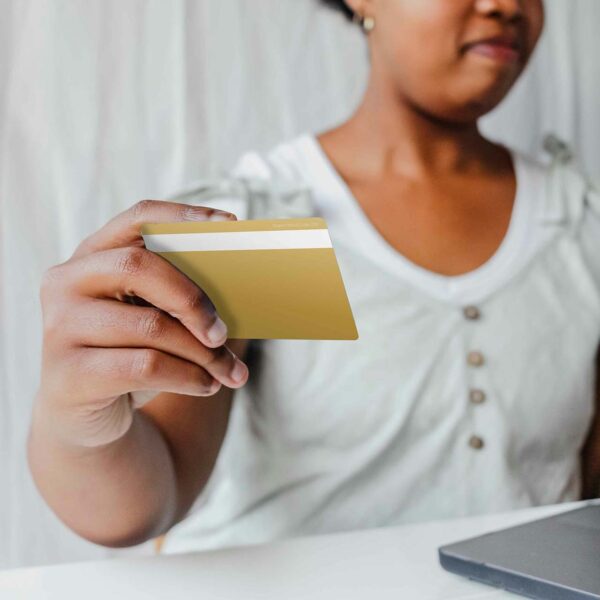 Person paying online with credit card.