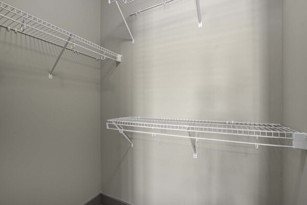 Closet with built in wire shelves.