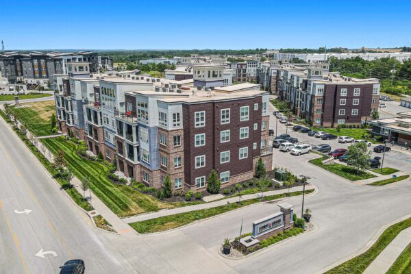 Summit Square apartments with lush landscaping and modern construction.