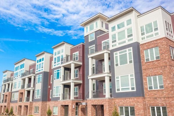 Summit Square apartments with modern architecture and brick construction.