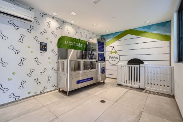 Sanctuary Doral apartments pet spa with dog wash machine.