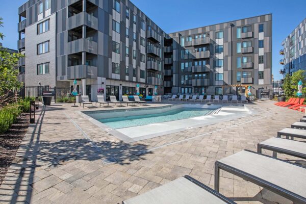 Arte KC pool area with lounge chairs and infinity edge pool.