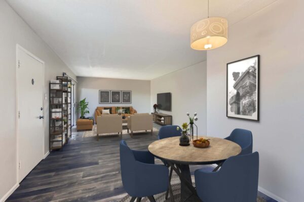 Aura at Midtown apartment living area with comfortable seating and dining spaces.