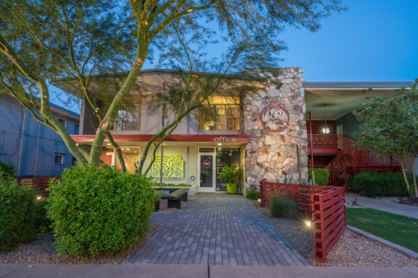 Aura at Midtown apartments with classic mid century construction and lush landscaping.