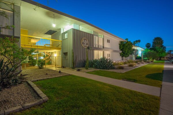 Aura at Midtown apartments with classic mid century construction and lush landscaping.
