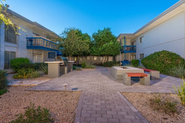 Aura at Midtown apartments patio with fire pit and built in BBQ grill.