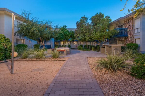Aura at Midtown apartments patio with fire pit and built in BBQ grill.