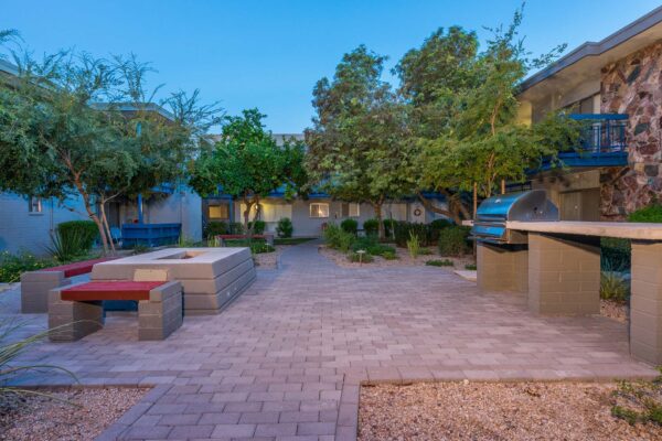 Aura at Midtown apartments patio with fire pit and built in BBQ grill.