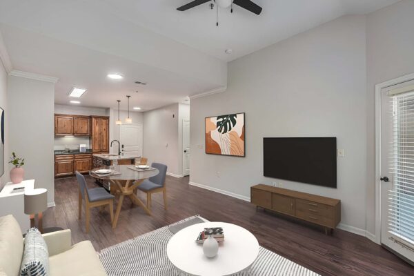Highlands Lodge apartment with wood style floor, comfortable living room and cozy kitchen.