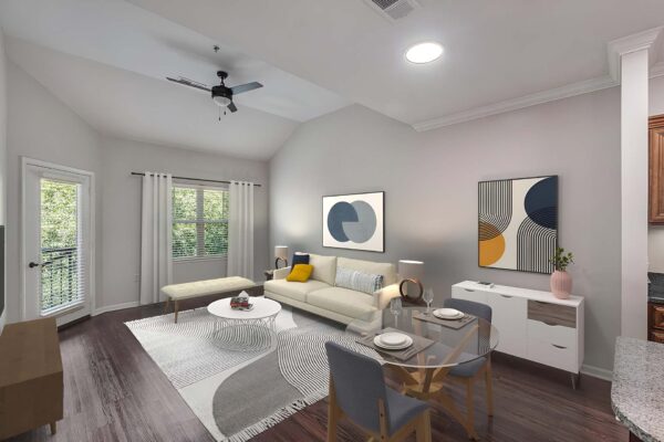 Highlands Lodge apartment living room with wood style floor, plush furniture, and door to balcony.