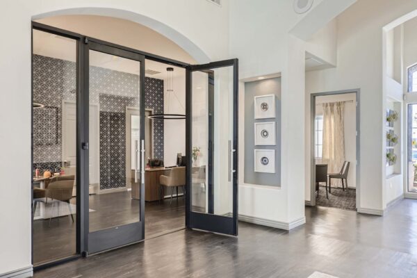 Mandarina apartments lobby with elegant leasing office and wood style floor.