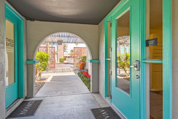 Omnia on Thomas apartments breezeway connecting fitness center to package room.