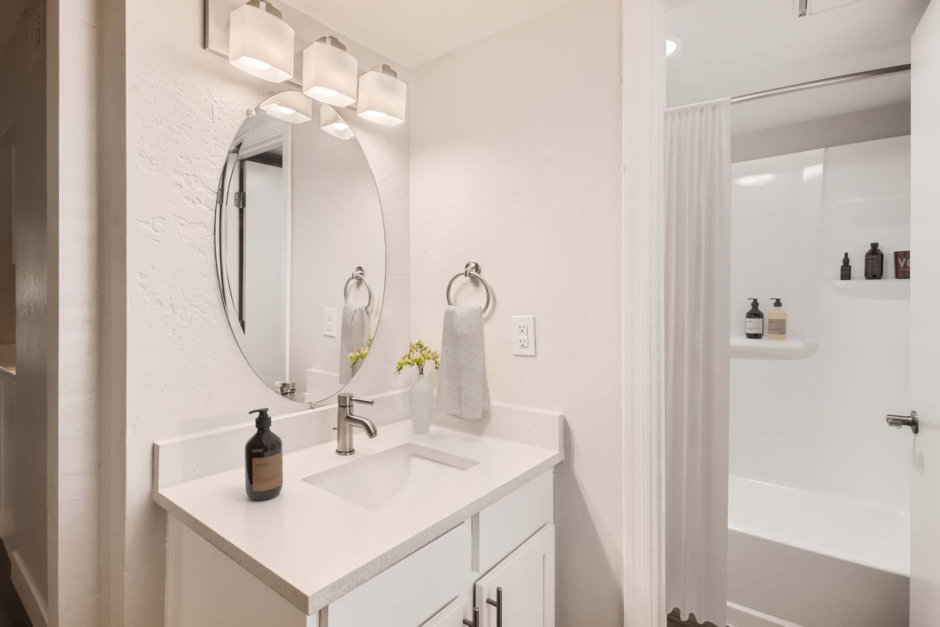 Apartment bathroom — representative home at Omnia on Thomas.