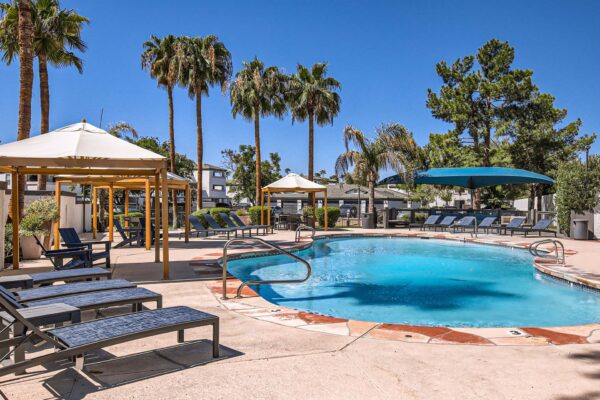 Pavilions at Arrowhead apartments with lounge chairs and gazebos.