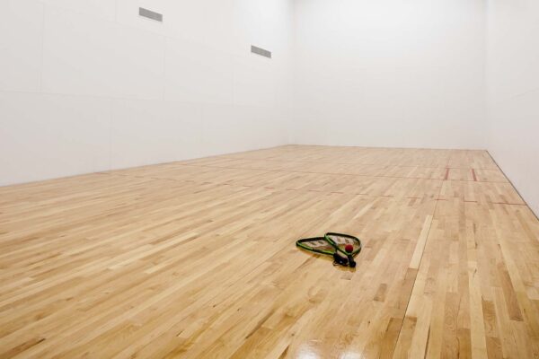 Prairie View at Village West apartments racquetball court with racquets.