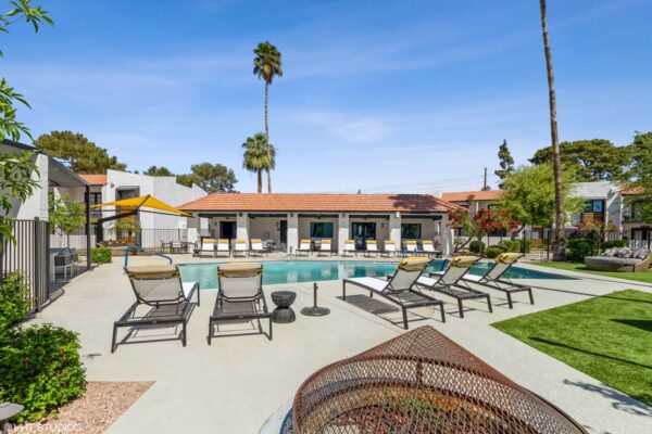 Tempe Vista apartments pool area with lounge chairs and fire pit.