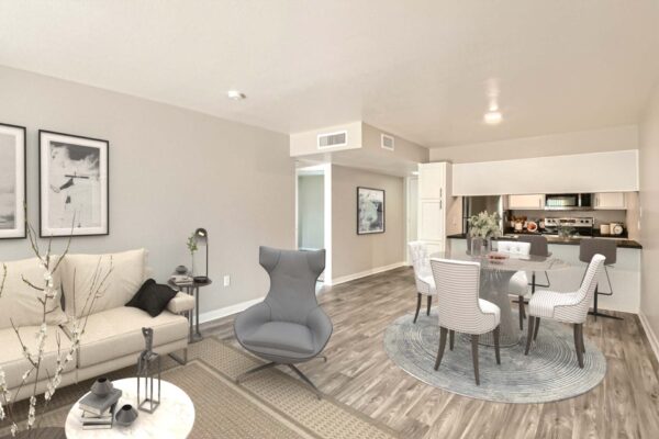 Tempe Vista apartment living room with plush seating, elegant dining area, and modern kitchen.