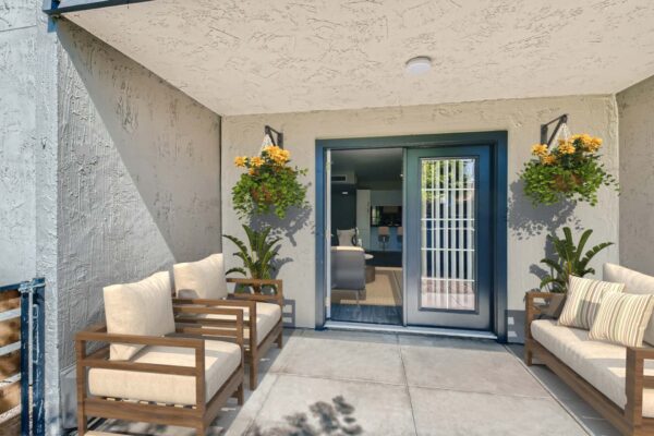Tempe Vista apartment balcony with plush outdoor furniture and plants.