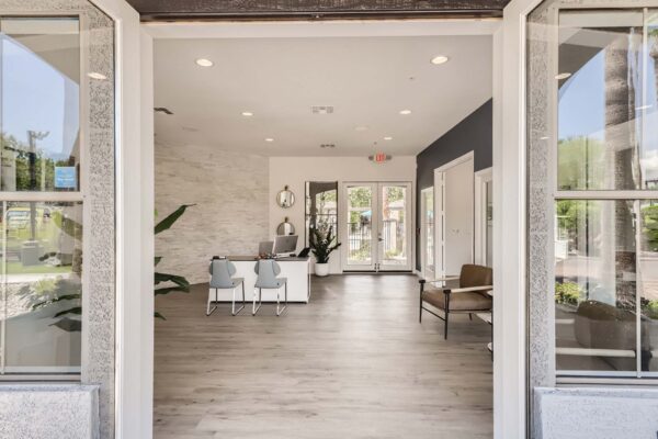 Villas at Mountain Vista Ranch apartments lobby entrance with leasing desk and waiting room.