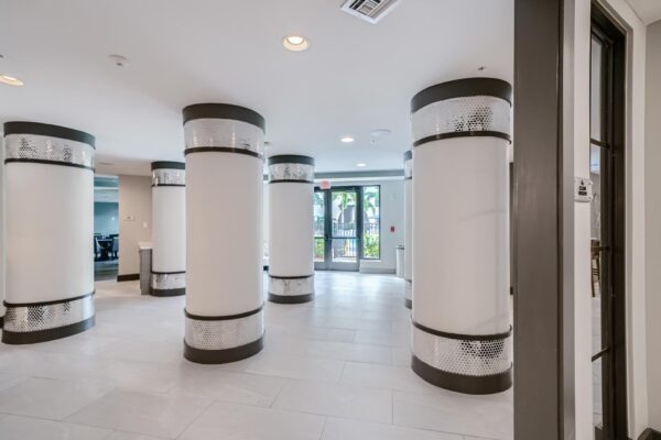 500 Ocean apartments lobby with tile floors and large round columns.