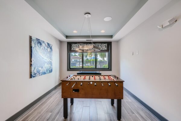 500 Ocean apartments clubhouse with foosball table and arcade games.