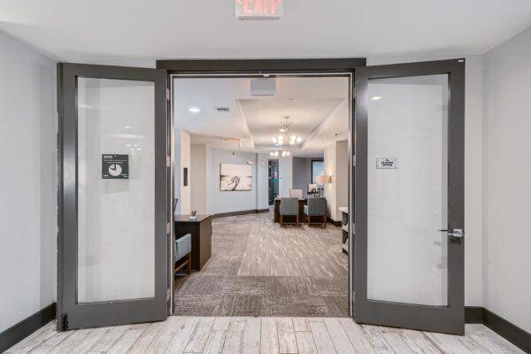 500 Ocean apartments leasing office with glass double doors.