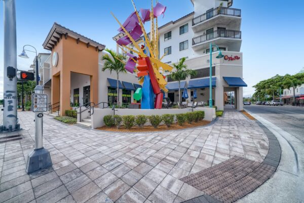 500 Ocean apartments exterior with colorful art sculpture.