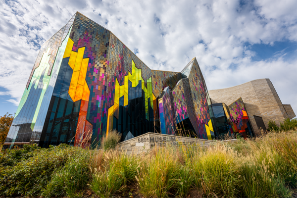 Colorful sculptural artwork on museum exterior.