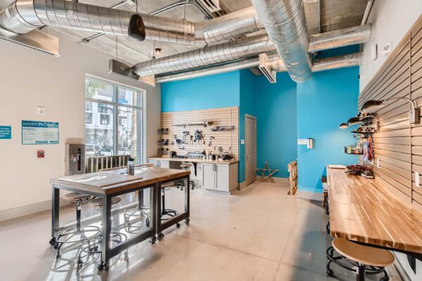 Arte St. Pete apartments makers space with tools and supplies.