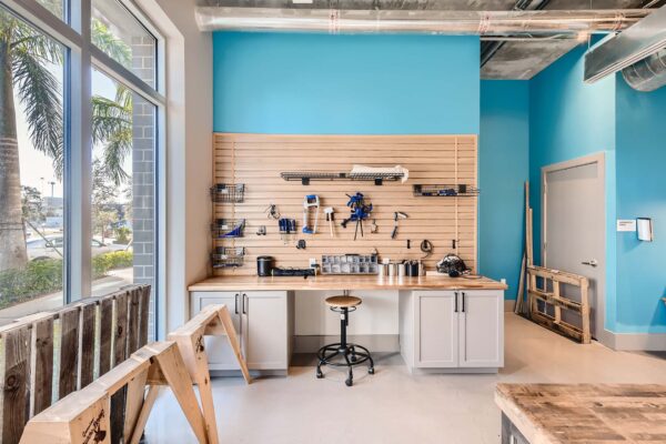 Arte St. Pete apartments makers space with tools and supplies.