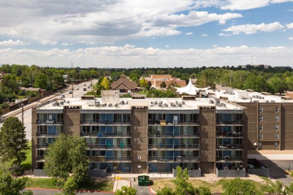 Beacon House apartments with classic brick construction and large balconies.