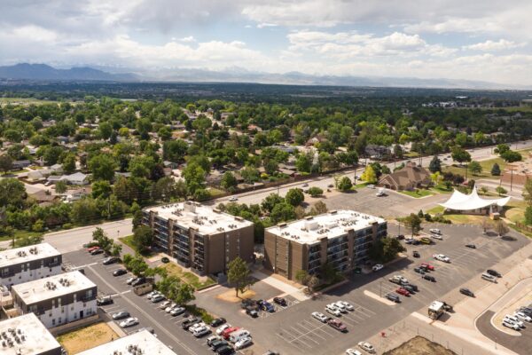 Beacon House apartments with classic brick construction, large balconies, and ample parking.