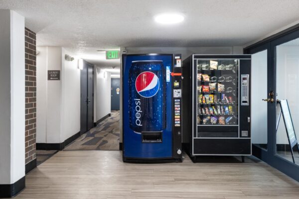 Beacon House apartments hallway with snack and drink vending machines.