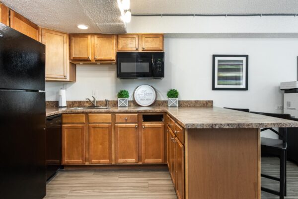 Beacon House apartments leasing office with community kitchen.