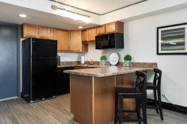 Beacon House apartments leasing office with community kitchen.