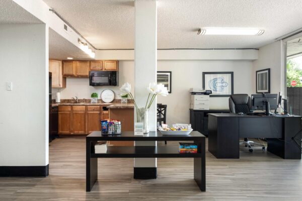 Beacon House apartments leasing office with reception area.