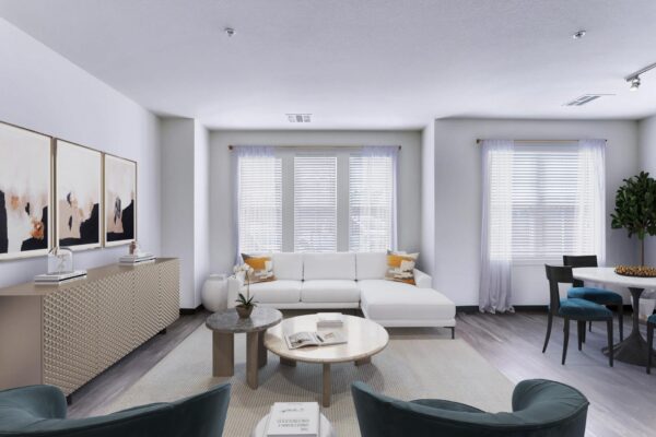 Centre Court apartment living room with plush seating, dining table, and large windows.