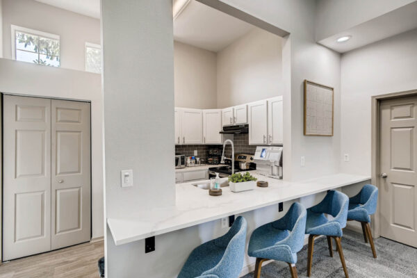 Copper Ridge apartments community kitchen with coffee and breakfast bar.