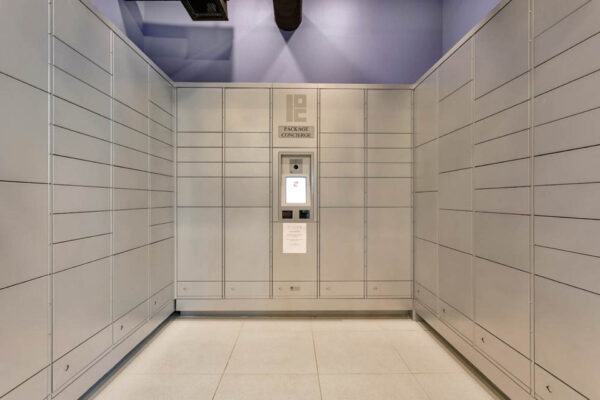 Forum Fitzsimons apartments mail room with package lockers.