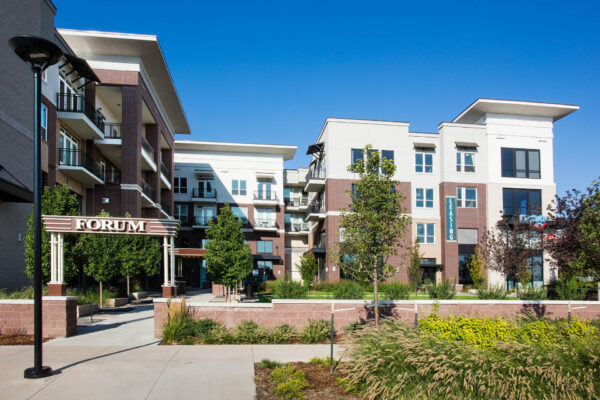 Forum Fitzsimons apartments courtyard with lush landscaping.