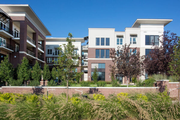 Forum Fitzsimons apartments courtyard with lush landscaping.
