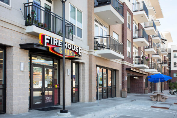 Forum Fitzsimons apartments with large balconies and Firehouse subs restaurant space.