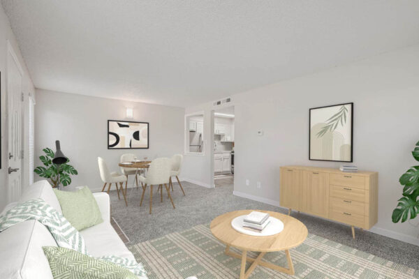Heights on Huron apartments living room with plush carpet, patterned rug, plush modern seating, dining seating, light fixture and modern kitchen.