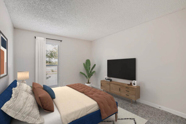 Heights on Huron apartments with plush carpet, bed with headboard, large windows and TV.