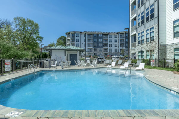 Residence at Old Hickory Lake apartments saltwater swimming pool with lounge seating.