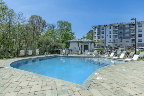 Residence at Old Hickory Lake apartments saltwater swimming pool with lounge seating.