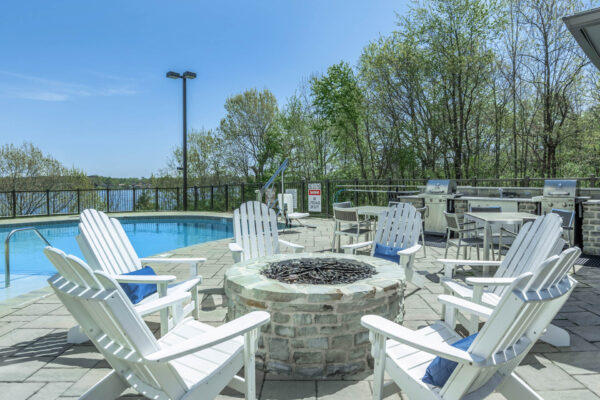 Residence at Old Hickory Lake apartments grilling stations, swimming pool and fire pit.