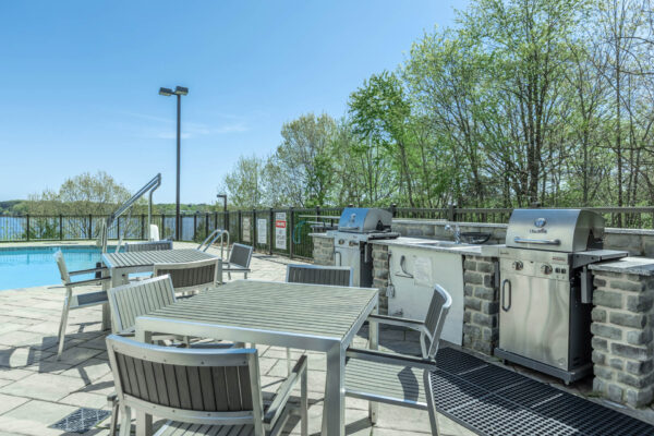Residence at Old Hickory Lake apartments summer kitchen with grilling stations.