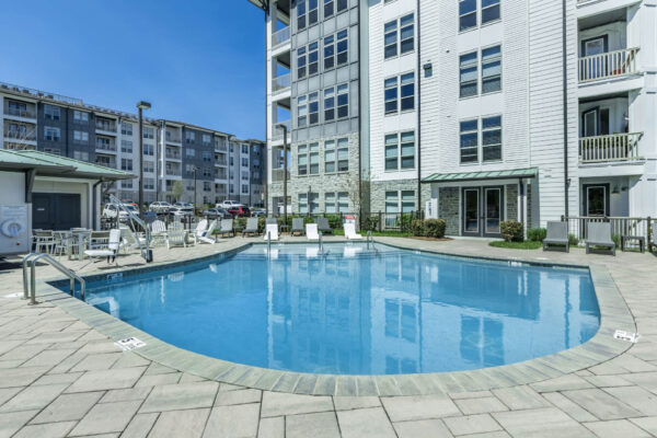Residence at Old Hickory Lake apartments saltwater swimming pool with lounge seating.