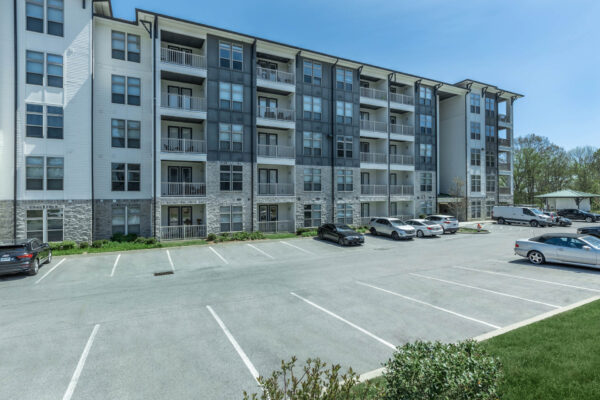 Residence at Old Hickory Lake apartments buildings with parking lot area.